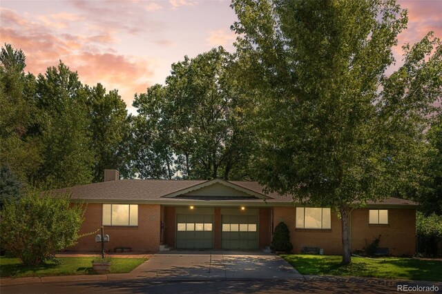 view of front of property with a garage