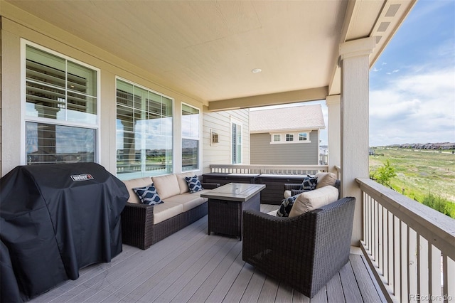 8761 S Wenatchee Ct, Aurora, CO 80016 - wooden deck featuring an outdoor living space and a grill