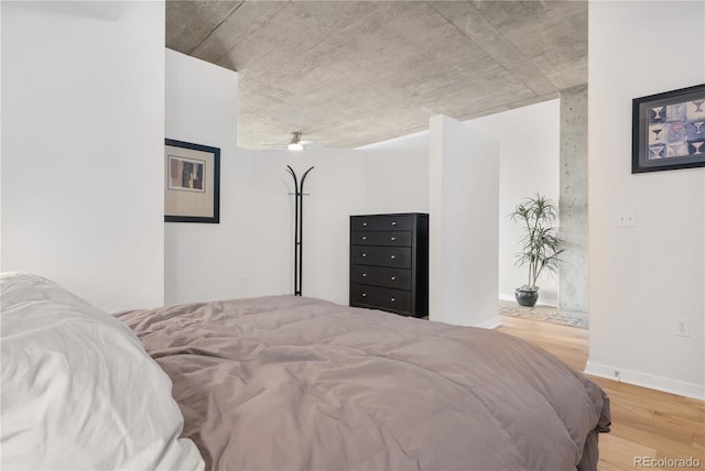 bedroom with light wood-type flooring