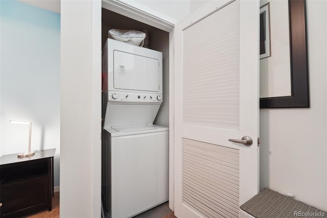 washroom with stacked washer / dryer