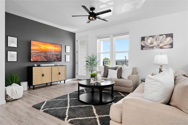12261 Farmview St, Thornton, CO 80241 - living room with light wood-style floors, ceiling fan, and baseboards