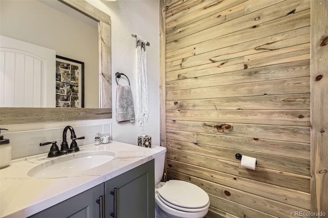 26591 E Calhoun Pl, Aurora, CO 80016 - half bath with vanity and wooden walls