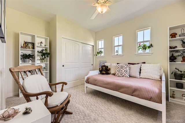 26591 E Calhoun Pl, Aurora, CO 80016 - carpeted bedroom featuring a closet and ceiling fan