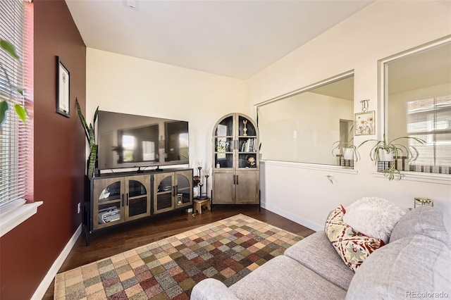 26591 E Calhoun Pl, Aurora, CO 80016 - living area featuring wood finished floors and baseboards