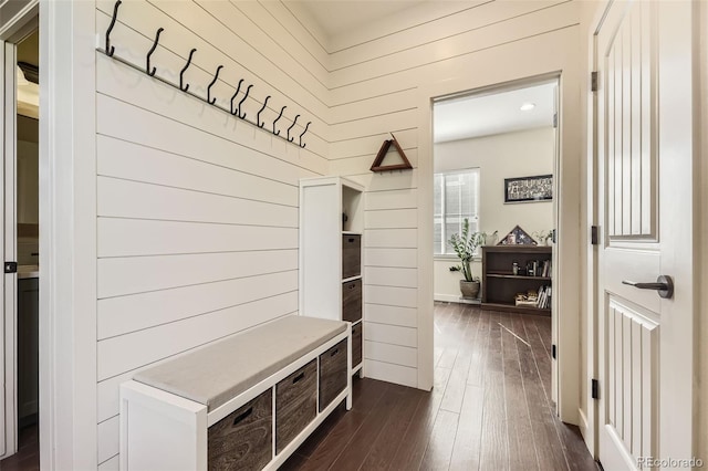 26591 E Calhoun Pl, Aurora, CO 80016 - mudroom featuring dark wood-style floors and wooden walls