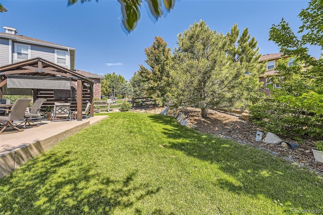 26591 E Calhoun Pl, Aurora, CO 80016 - view of green lawn with a patio