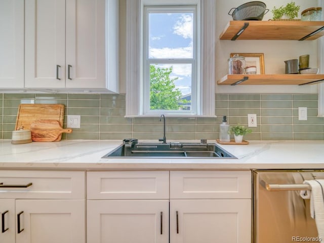 541 Fox St, Denver, CO 80204 - kitchen featuring dishwasher, open shelves, white cabinets, and decorative backsplash