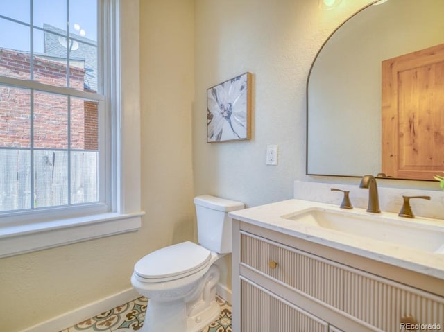 541 Fox St, Denver, CO 80204 - bathroom featuring vanity and plenty of natural light