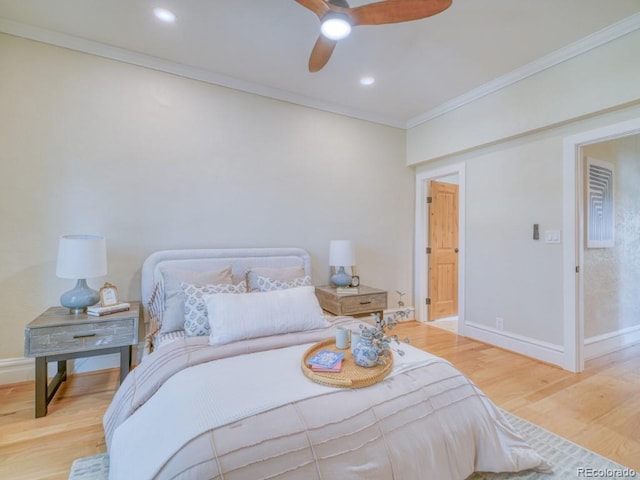541 Fox St, Denver, CO 80204 - bedroom featuring crown molding, wood finished floors, ceiling fan, and recessed lighting