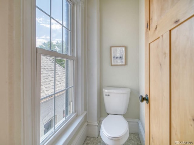 541 Fox St, Denver, CO 80204 - bathroom with baseboards and toilet