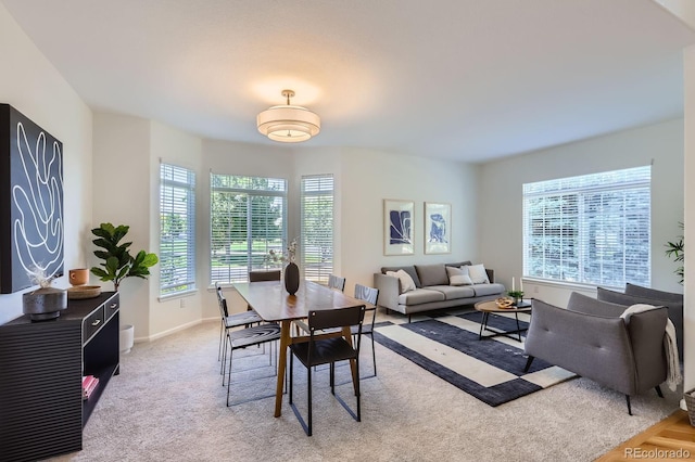 11729 Elmer Linn Dr, Longmont, CO 80504 - dining space featuring baseboards and light colored carpet
