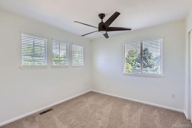 11729 Elmer Linn Dr, Longmont, CO 80504 - spare room with carpet floors and a ceiling fan