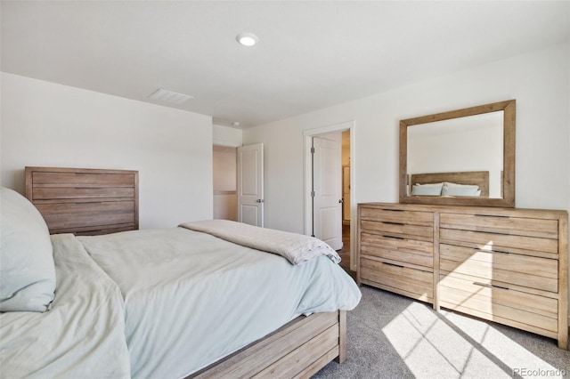 bedroom with carpet and visible vents