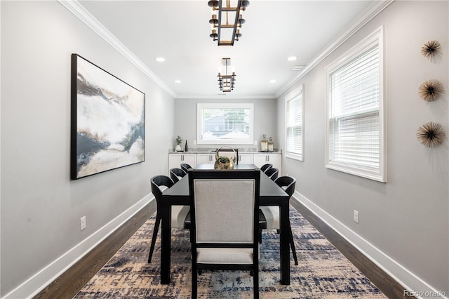 420 N Colorado Blvd, Denver, CO 80206 - dining area featuring a chandelier, dark wood finished floors, baseboards, ornamental molding, and recessed lighting