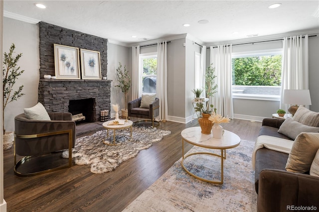420 N Colorado Blvd, Denver, CO 80206 - living room with ornamental molding, a fireplace, wood finished floors, baseboards, and recessed lighting