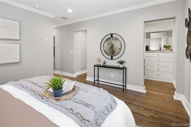 420 N Colorado Blvd, Denver, CO 80206 - bedroom with wood finished floors, crown molding, baseboards, and recessed lighting