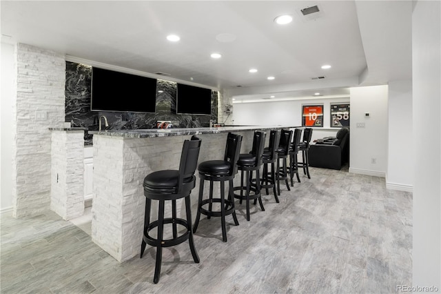 420 N Colorado Blvd, Denver, CO 80206 - indoor wet bar with light wood finished floors, recessed lighting, and baseboards