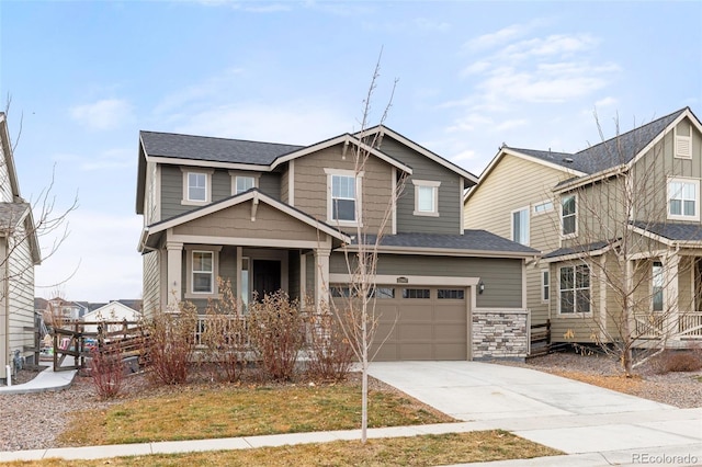 view of front of house featuring a front yard and a garage