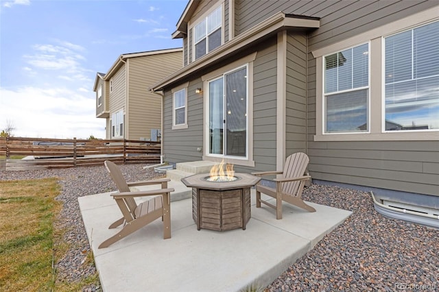 view of patio with a fire pit