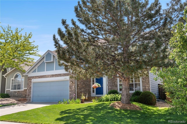 3102 White Oak Trl, Highlands Ranch, CO 80129 - view of property hidden behind natural elements with stone siding, concrete driveway, a garage, and a front lawn