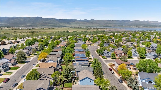3102 White Oak Trl, Highlands Ranch, CO 80129 - aerial view of residential area featuring a mountain backdrop