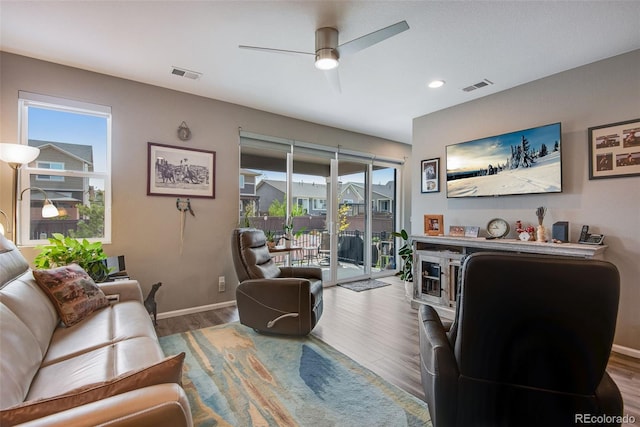 3022 Merlin Dr, Brighton, CO 80601 - living area with a ceiling fan, wood finished floors, baseboards, and recessed lighting