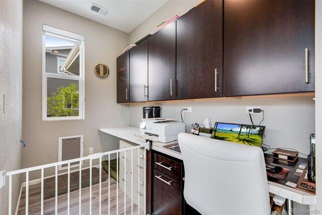 3022 Merlin Dr, Brighton, CO 80601 - office area with light wood finished floors and baseboards