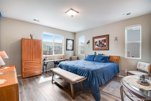 3022 Merlin Dr, Brighton, CO 80601 - bedroom with light wood finished floors and baseboards