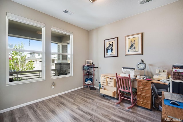 3022 Merlin Dr, Brighton, CO 80601 - office with wood finished floors and baseboards