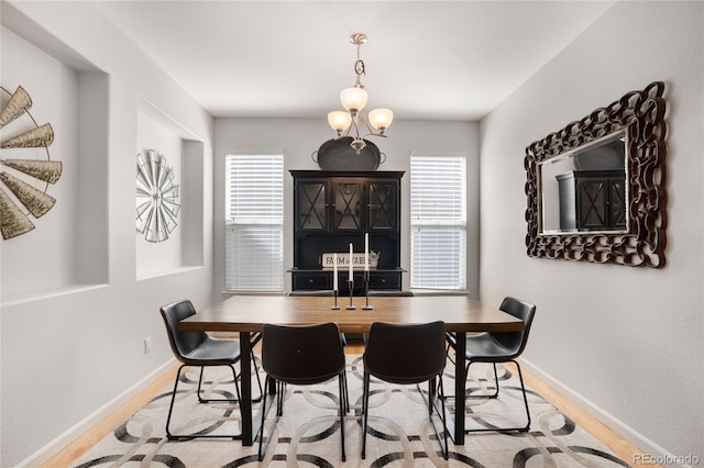 15502 E Flower Mound Pl, Parker, CO 80134 - dining area featuring wood finished floors and baseboards