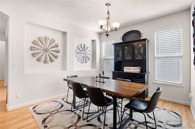 15502 E Flower Mound Pl, Parker, CO 80134 - dining area with light wood-type flooring and baseboards
