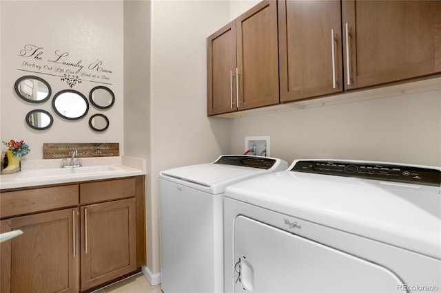 15502 E Flower Mound Pl, Parker, CO 80134 - laundry room featuring washing machine and dryer and cabinet space