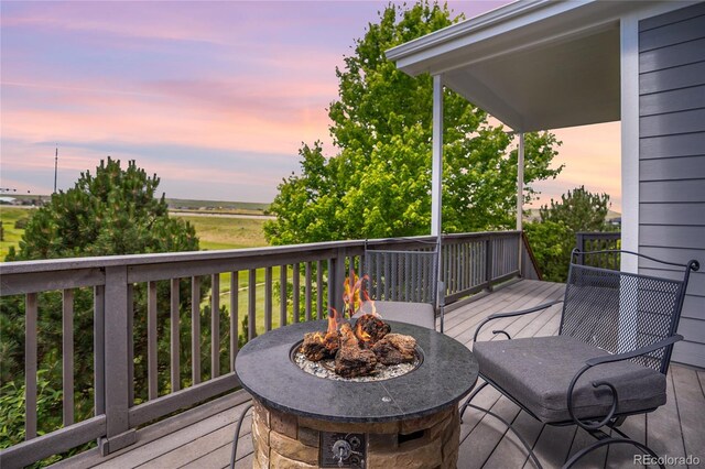 15502 E Flower Mound Pl, Parker, CO 80134 - wooden deck with a fire pit