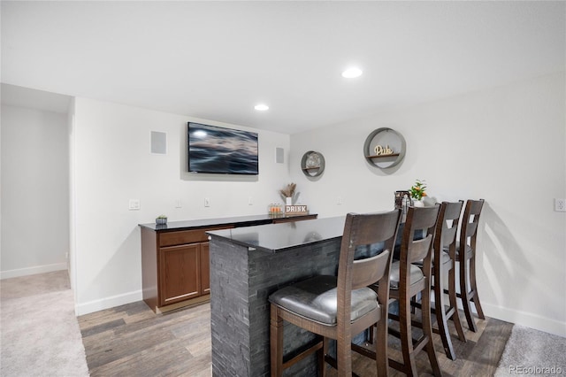 15502 E Flower Mound Pl, Parker, CO 80134 - indoor dry bar with recessed lighting and wood finished floors