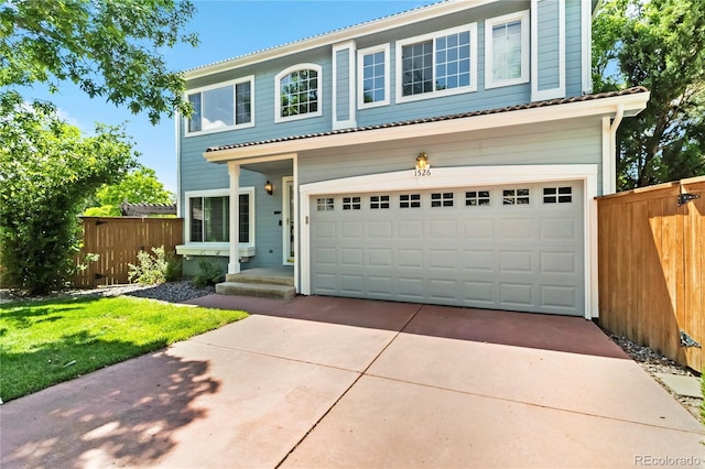 1526 Braewood Ave, Littleton, CO 80129 - traditional home with driveway and a garage