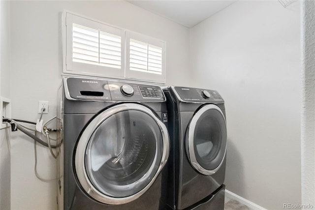 1526 Braewood Ave, Littleton, CO 80129 - washroom with separate washer and dryer and baseboards