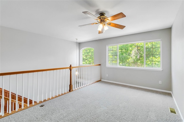 1526 Braewood Ave, Littleton, CO 80129 - carpeted spare room with ceiling fan and baseboards