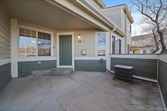 view of patio featuring central AC unit