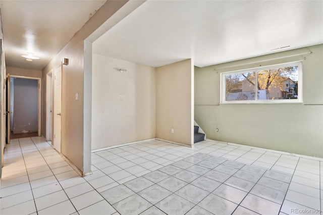 empty room featuring light tile patterned floors