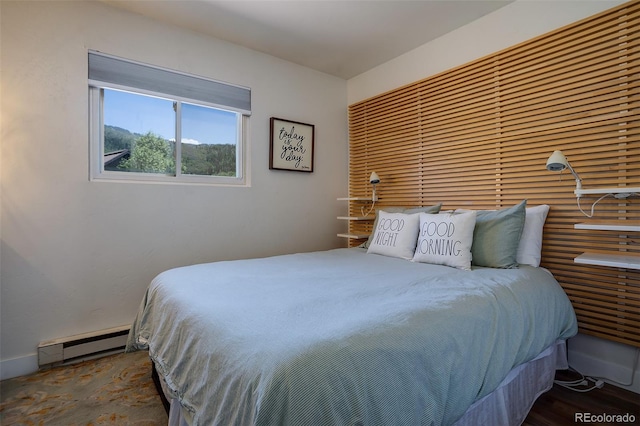 3295 Apres Ski Way Unit B9, Steamboat Springs, CO 80487 - bedroom featuring a baseboard heating unit