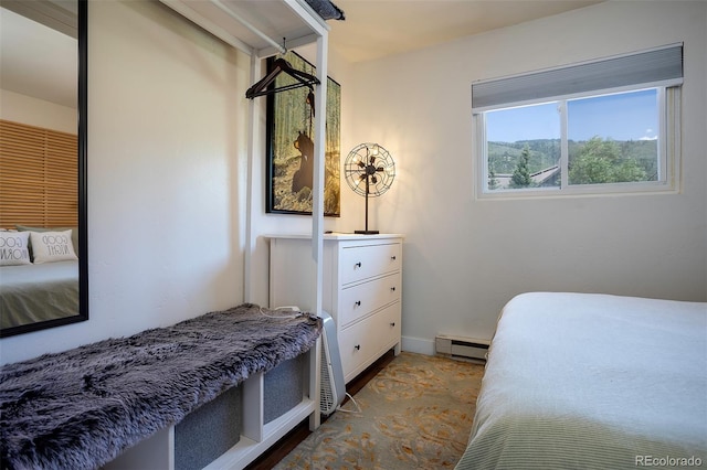 3295 Apres Ski Way Unit B9, Steamboat Springs, CO 80487 - bedroom with baseboard heating and baseboards