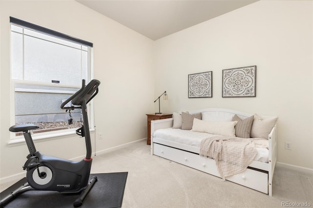 workout room with carpet floors and baseboards