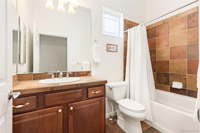 bathroom with tile patterned flooring, vanity, toilet, and shower / bath combo