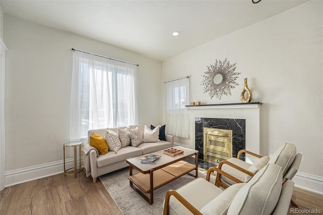 715 W 7th Ave, Denver, CO 80204 - living room with a fireplace, wood finished floors, and recessed lighting