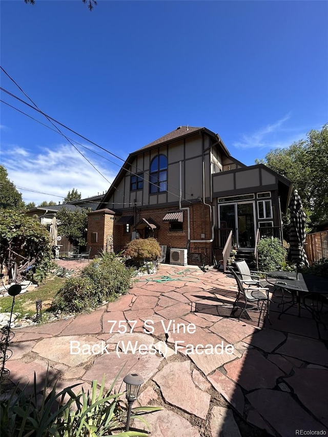 rear view of house featuring a patio area