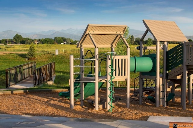 2415 Bluestem Willow Dr, Loveland, CO 80538 - community jungle gym featuring a mountain view