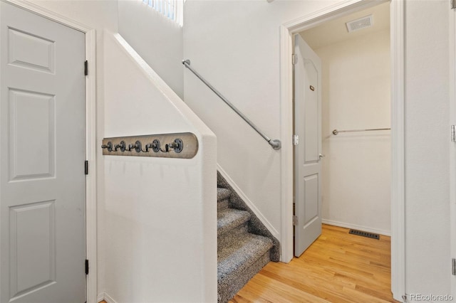 7046 Sand Crest Vw, Colorado Springs, CO 80923 - stairs featuring wood finished floors and baseboards
