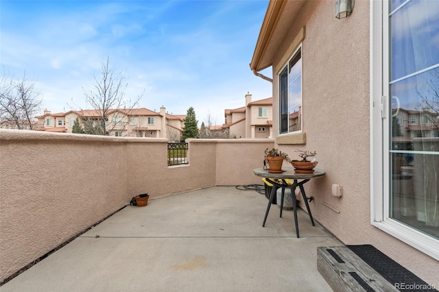 7046 Sand Crest Vw, Colorado Springs, CO 80923 - view of patio / terrace featuring a residential view