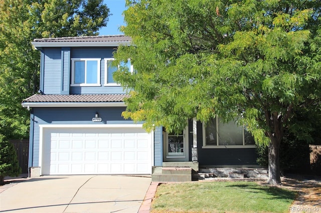 view of front of property with a garage