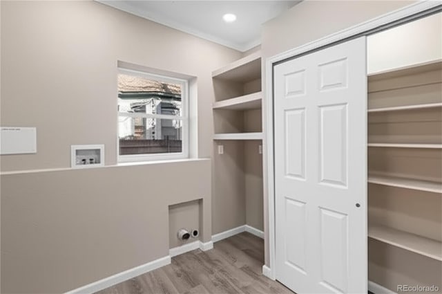 1021 Lake Ave, Pueblo, CO 81004 - laundry area with wood finished floors, washer hookup, baseboards, and electric dryer hookup